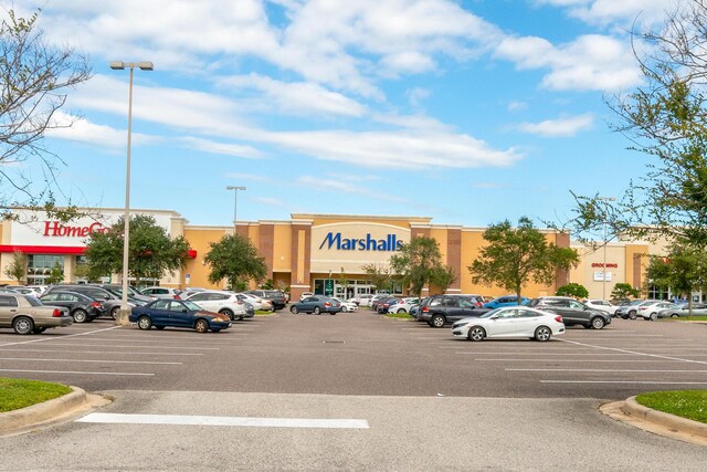 1441 Sheafe Ave NE Unit 104, Palm Bay, FL 32905 - view of uncovered parking lot