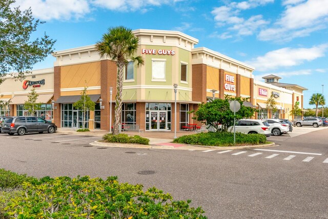 1441 Sheafe Ave NE Unit 104, Palm Bay, FL 32905 - view of commercial location with uncovered parking