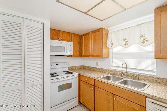 2358 Golf Lake Cir Unit 212, Melbourne, FL 32935 - kitchen featuring white appliances, light countertops, and light tile patterned floors