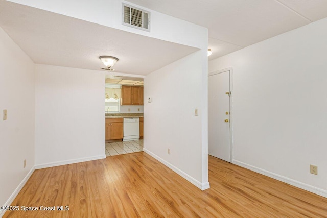 2358 Golf Lake Cir Unit 212, Melbourne, FL 32935 - unfurnished living room with light wood-style floors