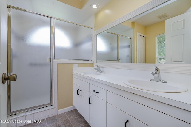 146 Oakcrest Ave NE, Palm Bay, FL 32907 - bathroom with double vanity and a shower stall