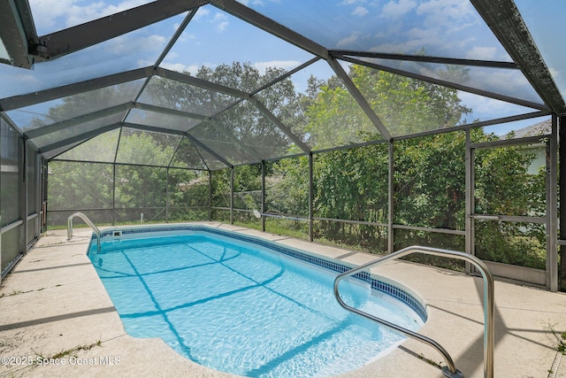 146 Oakcrest Ave NE, Palm Bay, FL 32907 - swimming pool with a patio area and a lanai