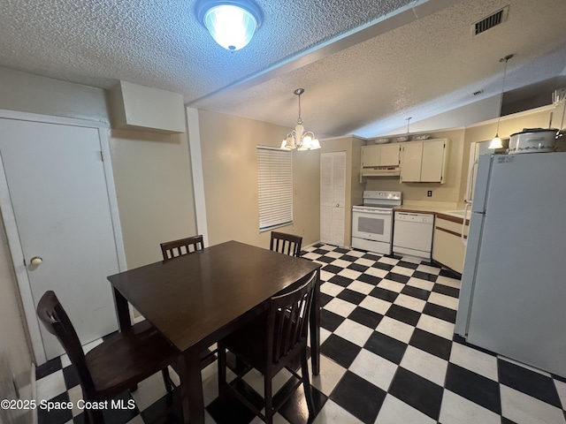 1385 Salerno Ave SE, Palm Bay, FL 32909 - dining space with light flooring, a textured ceiling, a chandelier, and lofted ceiling