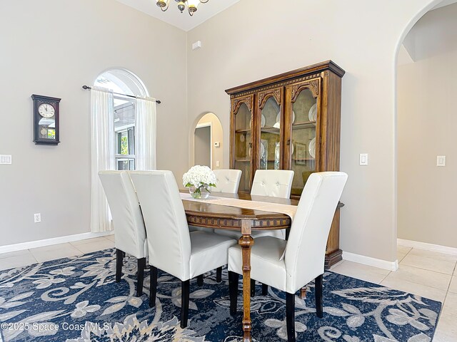 603 Cross Creek Dr, Sebastian, FL 32958 - dining room with arched walkways and light tile patterned floors