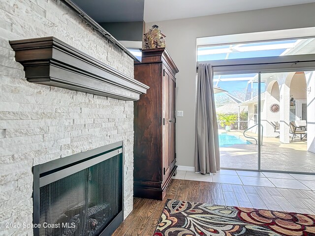 603 Cross Creek Dr, Sebastian, FL 32958 - entryway featuring a fireplace and wood finished floors
