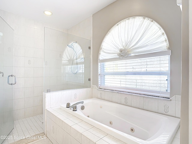 603 Cross Creek Dr, Sebastian, FL 32958 - full bath with a stall shower, a jetted tub, and recessed lighting