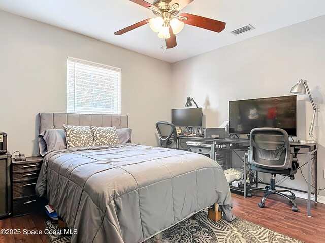 603 Cross Creek Dr, Sebastian, FL 32958 - bedroom with wood finished floors, an office area, and ceiling fan