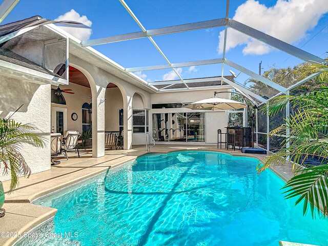 603 Cross Creek Dr, Sebastian, FL 32958 - swimming pool with a patio, a lanai, and ceiling fan