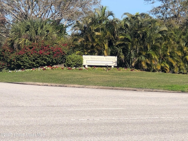 603 Cross Creek Dr, Sebastian, FL 32958 - view of asphalt street featuring curbs