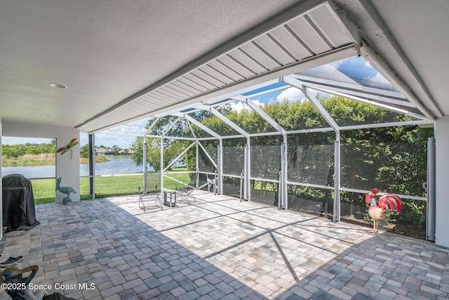 4448 Heaton Park Trl, Rockledge, FL 32955 - view of patio with a water view, a lanai, and a grill