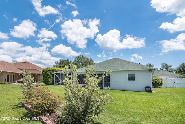 4448 Heaton Park Trl, Rockledge, FL 32955 - rear view of house featuring stucco siding, roof with shingles, and a lanai
