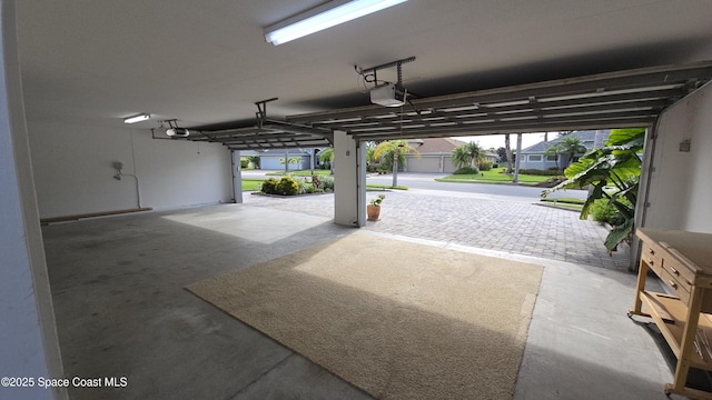 4448 Heaton Park Trl, Rockledge, FL 32955 - garage featuring a garage door opener