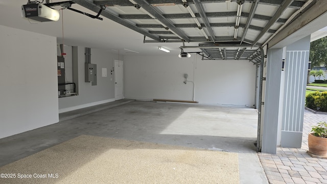 4448 Heaton Park Trl, Rockledge, FL 32955 - garage with a garage door opener and electric panel