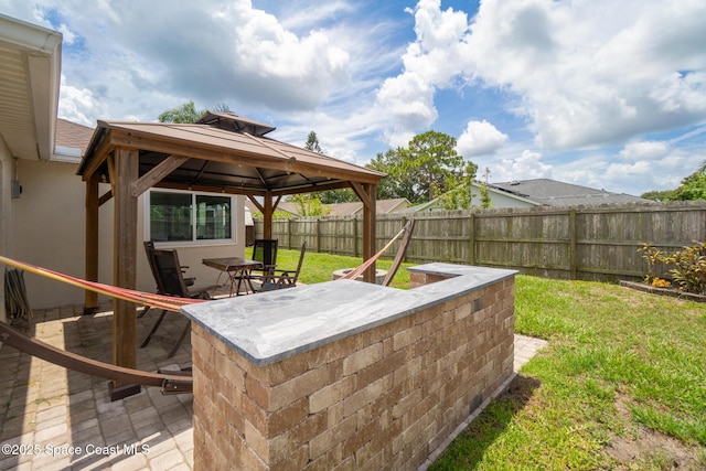 967 Sabal Grove Dr, Rockledge, FL 32955 - fenced backyard with a gazebo and a patio area