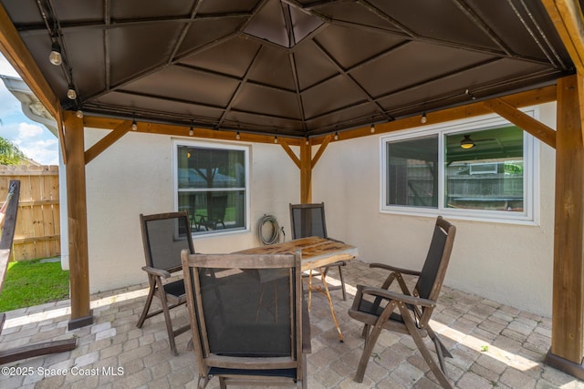 967 Sabal Grove Dr, Rockledge, FL 32955 - view of patio featuring a gazebo and outdoor dining area