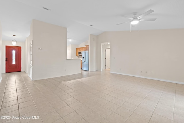 967 Sabal Grove Dr, Rockledge, FL 32955 - unfurnished living room featuring light tile patterned floors, vaulted ceiling, and ceiling fan