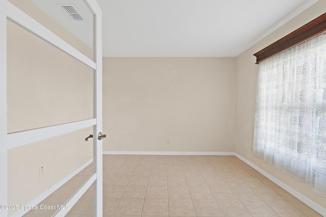 967 Sabal Grove Dr, Rockledge, FL 32955 - unfurnished room with light tile patterned floors and baseboards