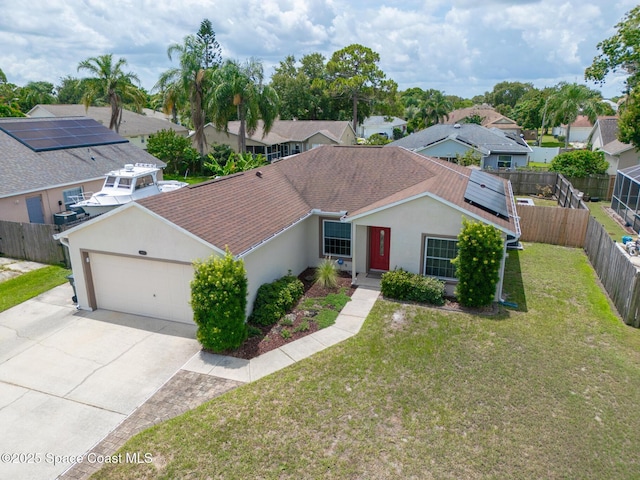 967 Sabal Grove Dr, Rockledge, FL 32955 - view of front facade featuring stucco siding, concrete driveway, an attached garage, a fenced backyard, and a shingled roof