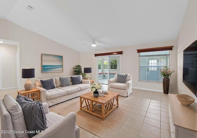967 Sabal Grove Dr, Rockledge, FL 32955 - living room with vaulted ceiling, ceiling fan, and light tile patterned floors