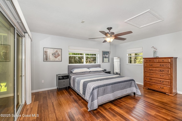 1995 Mark Twain Ln NE, Palm Bay, FL 32905 - bedroom featuring attic access, wood finished floors, multiple windows, and ceiling fan