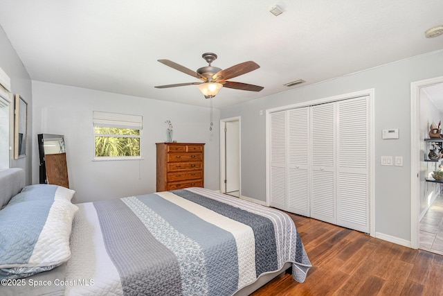 1995 Mark Twain Ln NE, Palm Bay, FL 32905 - bedroom with wood finished floors, a closet, and ceiling fan