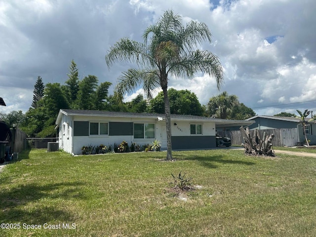 2681 Trammel Ave, Melbourne, FL 32935 - view of front of home featuring a carport and stucco siding