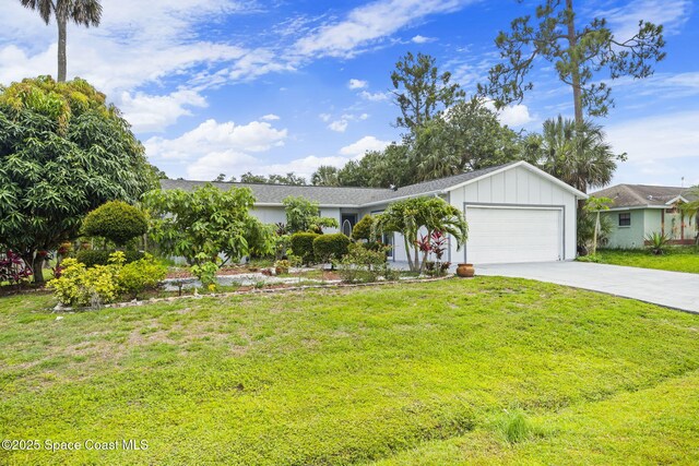 458 Stendal Rd NW, Palm Bay, FL 32907 - ranch-style home featuring an attached garage, driveway, a front yard, and board and batten siding