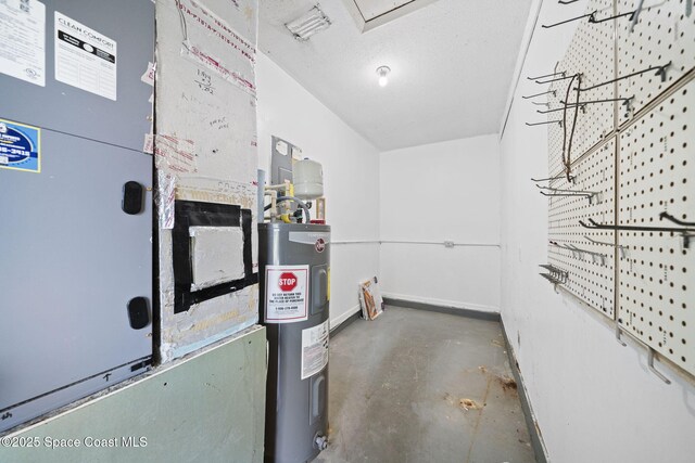 458 Stendal Rd NW, Palm Bay, FL 32907 - utility room featuring electric water heater and heating unit