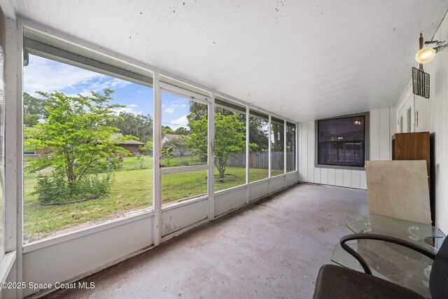 458 Stendal Rd NW, Palm Bay, FL 32907 - unfurnished sunroom featuring healthy amount of natural light
