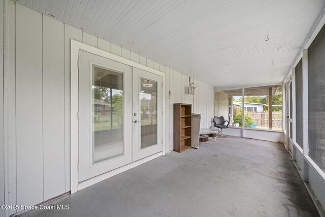 458 Stendal Rd NW, Palm Bay, FL 32907 - unfurnished sunroom with french doors