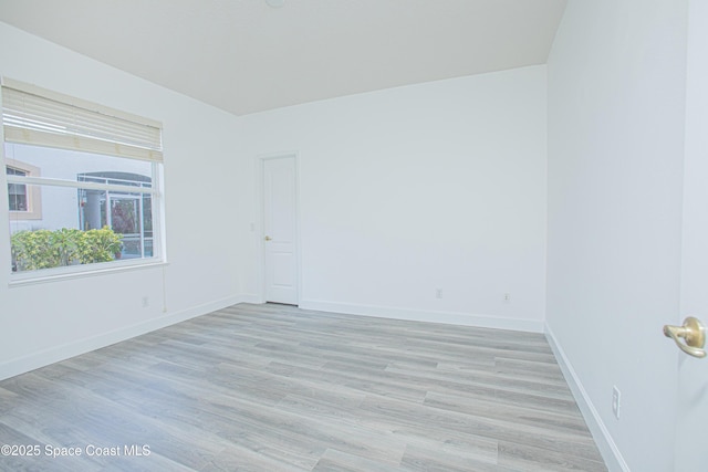 4180 Stoney Point Rd, Melbourne, FL 32940 - empty room featuring light wood finished floors and baseboards