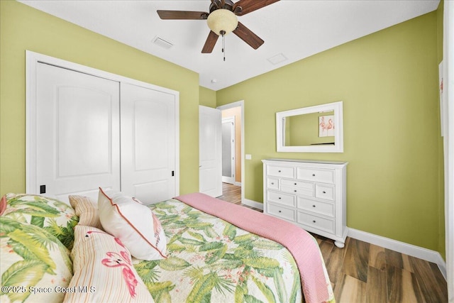 4464 Preservation Cir, Melbourne, FL 32934 - bedroom with wood finished floors, a closet, and ceiling fan