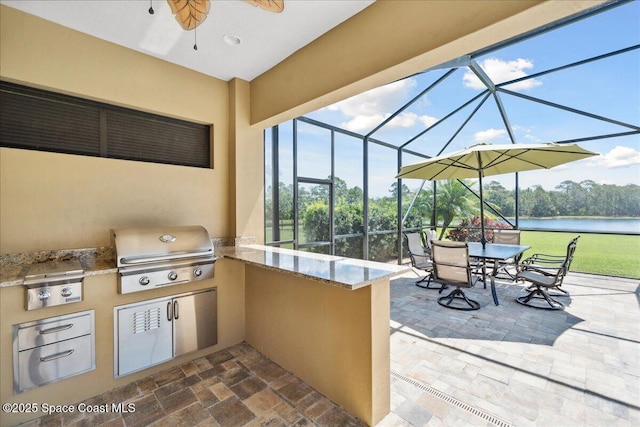 4464 Preservation Cir, Melbourne, FL 32934 - view of patio / terrace featuring area for grilling, a water view, a lanai, and outdoor dining space