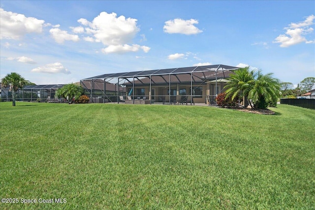 4464 Preservation Cir, Melbourne, FL 32934 - back of house with a lawn and glass enclosure