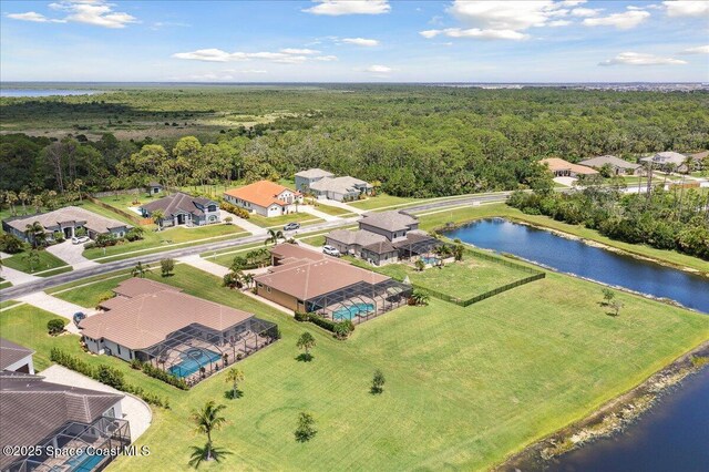 4464 Preservation Cir, Melbourne, FL 32934 - aerial perspective of suburban area with a heavily wooded area and a large body of water