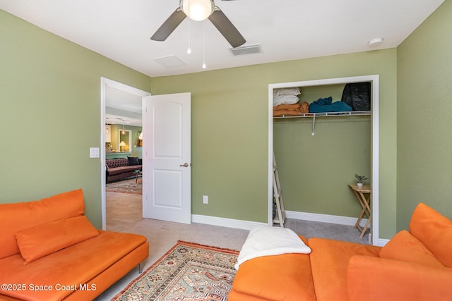 950 Douglas St SE, Palm Bay, FL 32909 - living room featuring a ceiling fan and carpet flooring