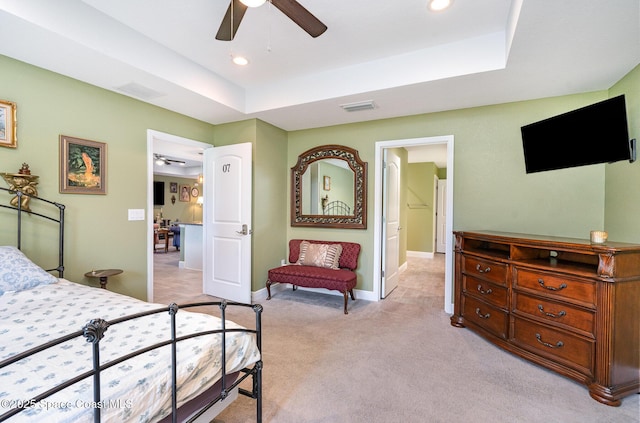 950 Douglas St SE, Palm Bay, FL 32909 - bedroom featuring recessed lighting, a tray ceiling, light colored carpet, and ceiling fan