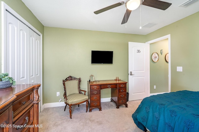 950 Douglas St SE, Palm Bay, FL 32909 - bedroom with light carpet, a closet, and ceiling fan