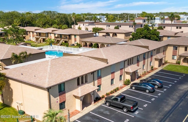 116 San Paulo Cir Unit 16-116, West Melbourne, FL 32904 - aerial perspective of suburban area with a pool area