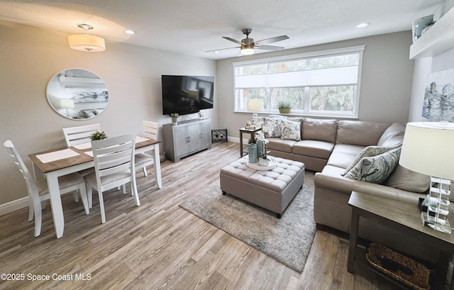 225 Buccaneer Ave Unit C2-207, Merritt Island, FL 32952 - living area with light wood-style flooring, a ceiling fan, and recessed lighting
