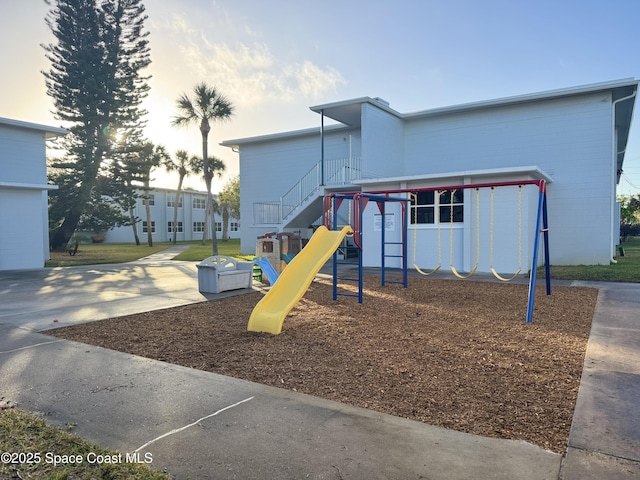 225 Buccaneer Ave Unit C2-207, Merritt Island, FL 32952 - playground at dusk with a playground