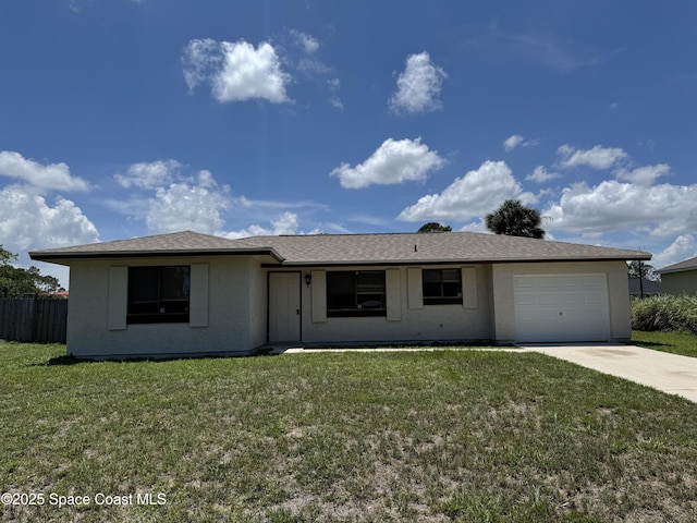 1112 Wabash Rd SE, Palm Bay, FL 32909 - single story home featuring an attached garage, concrete driveway, and stucco siding