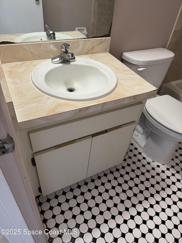 1112 Wabash Rd SE, Palm Bay, FL 32909 - bathroom featuring vanity and toilet