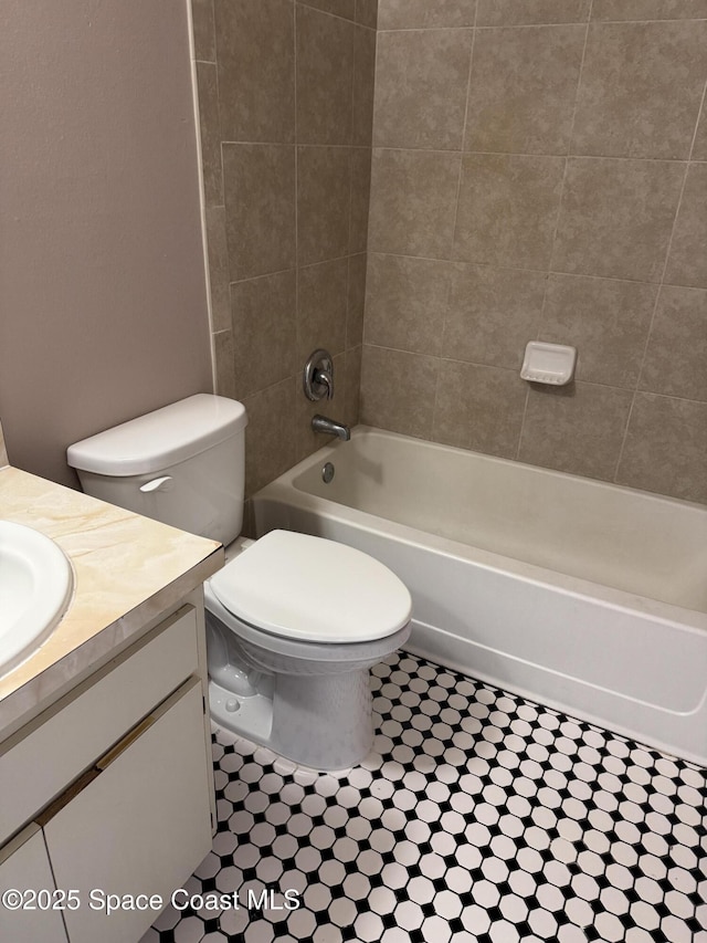 1112 Wabash Rd SE, Palm Bay, FL 32909 - full bathroom with vanity, bathtub / shower combination, and tile patterned floors