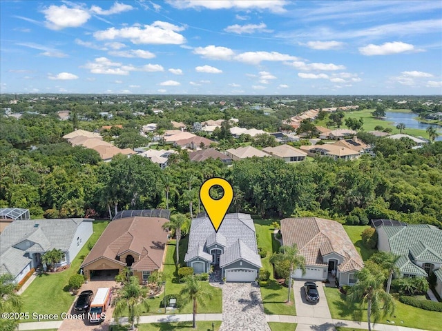 984 Wimbledon Dr, Melbourne, FL 32940 - aerial perspective of suburban area with a large body of water