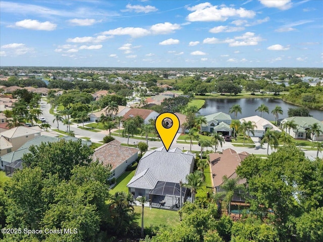984 Wimbledon Dr, Melbourne, FL 32940 - aerial perspective of suburban area with a large body of water