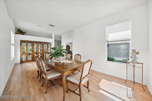 984 Wimbledon Dr, Melbourne, FL 32940 - dining room featuring light wood finished floors