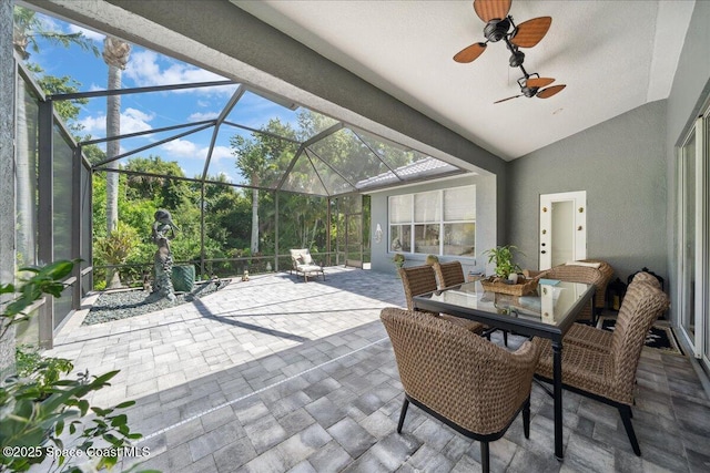 984 Wimbledon Dr, Melbourne, FL 32940 - view of patio with a lanai, a ceiling fan, and outdoor dining area