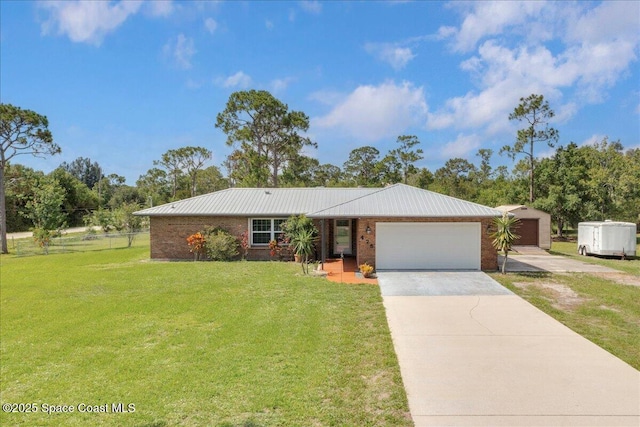 475 Atz Rd, Malabar, FL 32950 - ranch-style home with concrete driveway, brick siding, a garage, and a metal roof