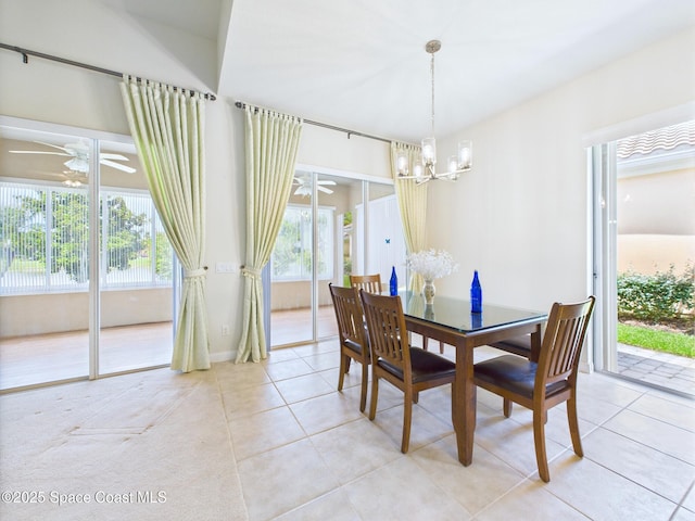 3531 Plume Way SE, Palm Bay, FL 32909 - dining room with light tile patterned flooring, a chandelier, and ceiling fan